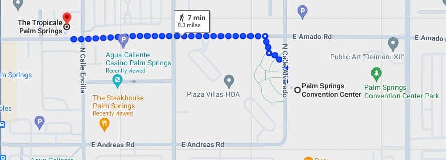A screenshot of a Google Maps route showing a walking path from The Tropicale in Palm Springs to another location, indicated by a dotted blue line that takes approximately 7 minutes to travel 0.3 miles. The map also displays nearby points of interest and parking areas.