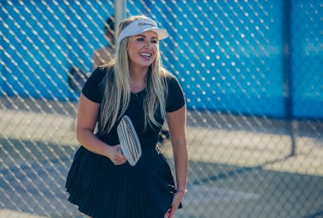 Woman playing pickleball