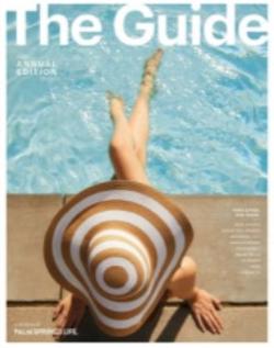 The Guide - September 2021 - woman sitting by the pool with a sun hat