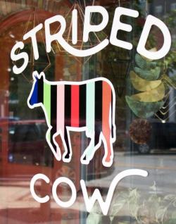 STRIPED COW logo