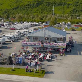 an aerial view of an RV park and camp office