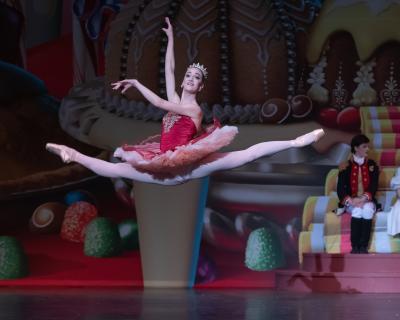 Ballet Dancer leaping into the air during Nutcracker performance