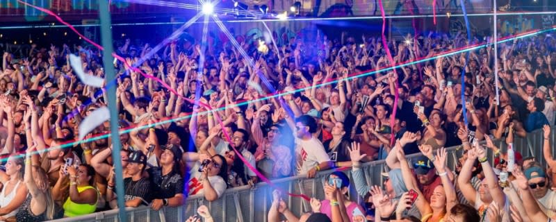 The crowd at Somewhere Fest Cheers during a performance