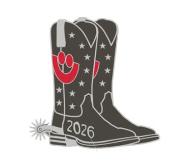 Black enamel pin shaped like a pair of cowboy boots with white stars, red accents, silver trim, a spur detail and the year “2026” displayed on the boot.