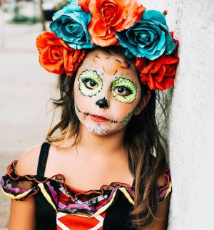 Little girl made up for Dia de los Muertos