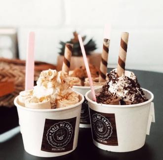different flavors of hand crafted rolled ice cream in cups