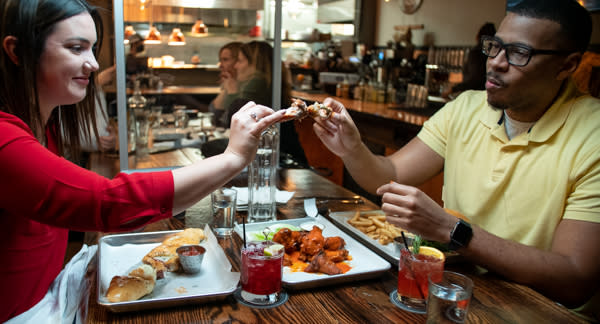 Rubber Soul couple eating dinner