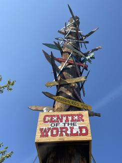Rock Rest Lodge Center Of The World Sign