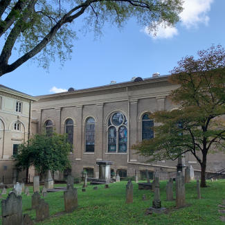 Exterior of the First Presbyterian with a cemetery