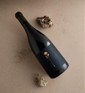 A bottle of Rose & Arrow Estate 2023 Touchstone Pinot noir.