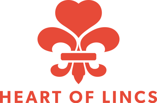 A logo of a red fleur de lis for the Heart of Lincs