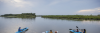 People in three kayaks in the Mobile delta