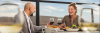 With Rib Mountain in the background, a couple dines at the rooftop restaurant, The Velveteen Plum