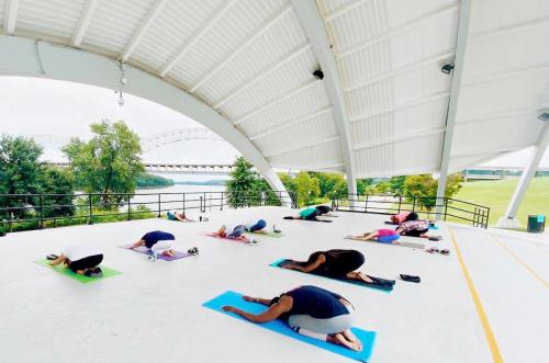 Yoga at the New Albany Amphitheater by Heart & Wellness.