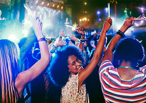 Woman smiling at concert