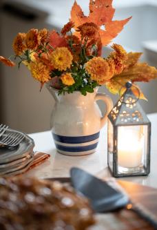 Leaf Decor in Buttermilk Server with Lanterns and Pie