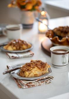 Slice of pie with cup of coffee