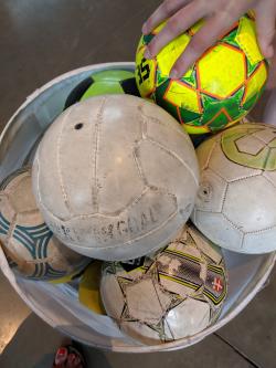 A bin of soccer balls at Soccerfest in Lehigh Valley, Pa