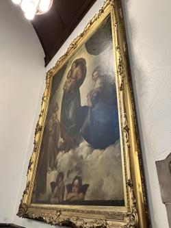 A 12-foot copy of Raphael's Sistine Madonna hangs in Phillip G. Cochran Memorial United Methodist Church in Dawson