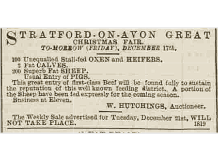 A clipping of a newspaper article from 1869. The newspaper is slightly sepia toned and the article in the photo describes a Christmas fair occurring that week in the town and the livestock that will be sold.