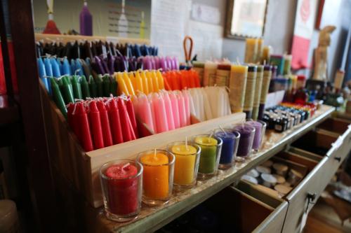 Rainbow candles are displayed at Evenstar's Chalice