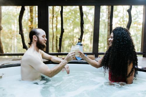 Couple sitting in hot tub at Shoji Spa