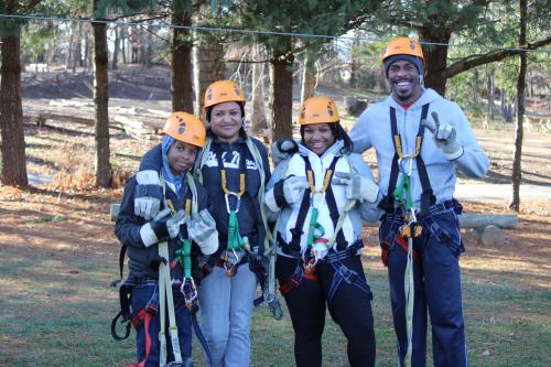 Family enjoying the fun at the Adventure Center of Asheville