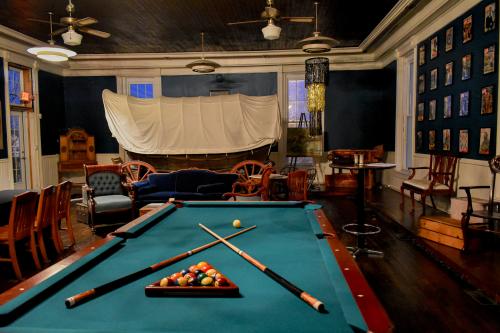 Pool table with balls and sticks at the 1894 Lodge in New Washington, IN