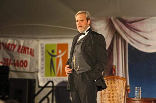Actor on stage during High Plains Chautauqua