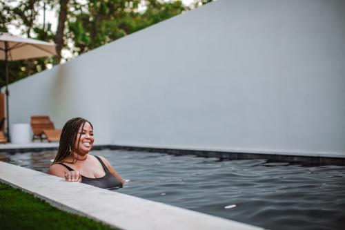 Woman in Hotel Beatnik pool Ocean Springs