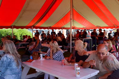 under a tent at Uke's Harley-Davidson event