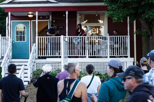 A shot of a band performing on Third St. during Marquette's Music on Third summer series