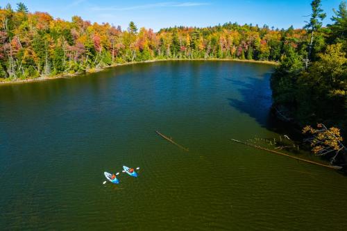 Kayakers on inland lake accessible via Raging River campground