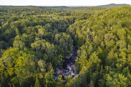An aerial view of Yellow Dog Falls in rugged Big Bay, MI
