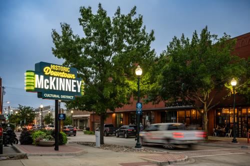 Neon yellow Historic Downtown McKinney sign