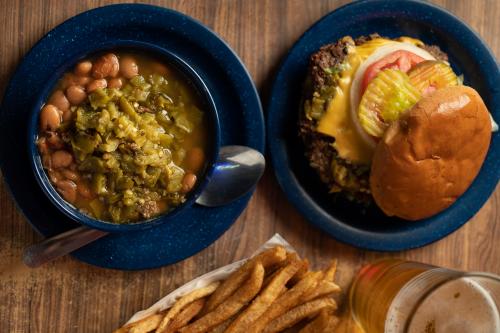 The green chile cheeseburger isn’t the only draw at the Original Owl Bar & Café—the ambience is just as good.