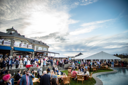 people crowded at derby party