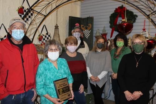 Owner and staff of Sinicropi Florist pose for a group photo for being honored with the December Business of the Month Award