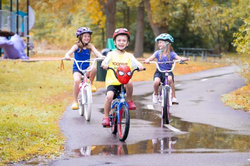 Young bikers on Colby Lake Loop in Woodbury
