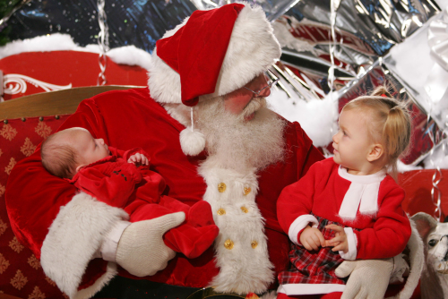 Santa with two children on his lap