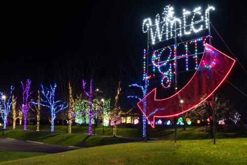An entrance sign to Winter Lights at the North Carolina Arboretum in Asheville, NC
