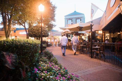 Men Walking Through Park Place