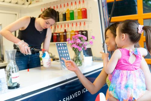 Mother and Daughter Ordering Shaved Ice