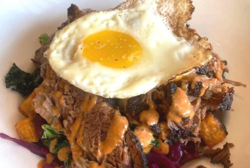Breakfast Hash with a fried egg on top at Harvest McKinney