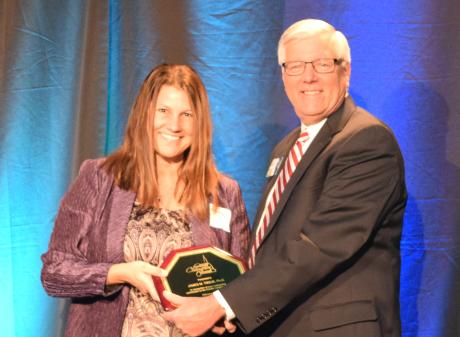 Shannon Manning, Ph. D. accepting the Community Champions award for James Tiedje, Ph. D.