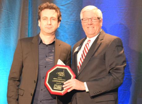 Andrea Shindler, Ph. D. accepts Community Champion Award