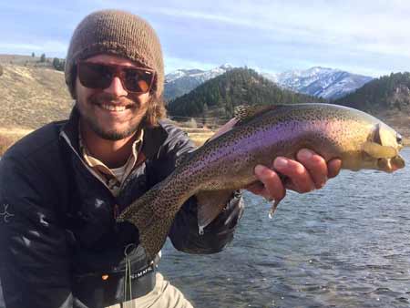 Chase Navratil with A Rainbow Trout | Photo: Alex Mansfield