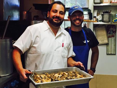 Perillo's Pizzeria owners in kitchen