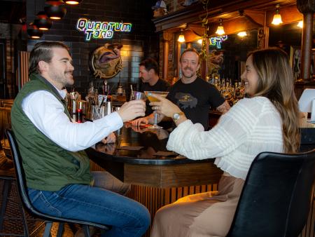 Quantum Toad, Couple Cheers at Bar