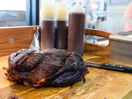 Redneck BBQ lab shoulder and sauce available in their restaurant near Benson, NC.